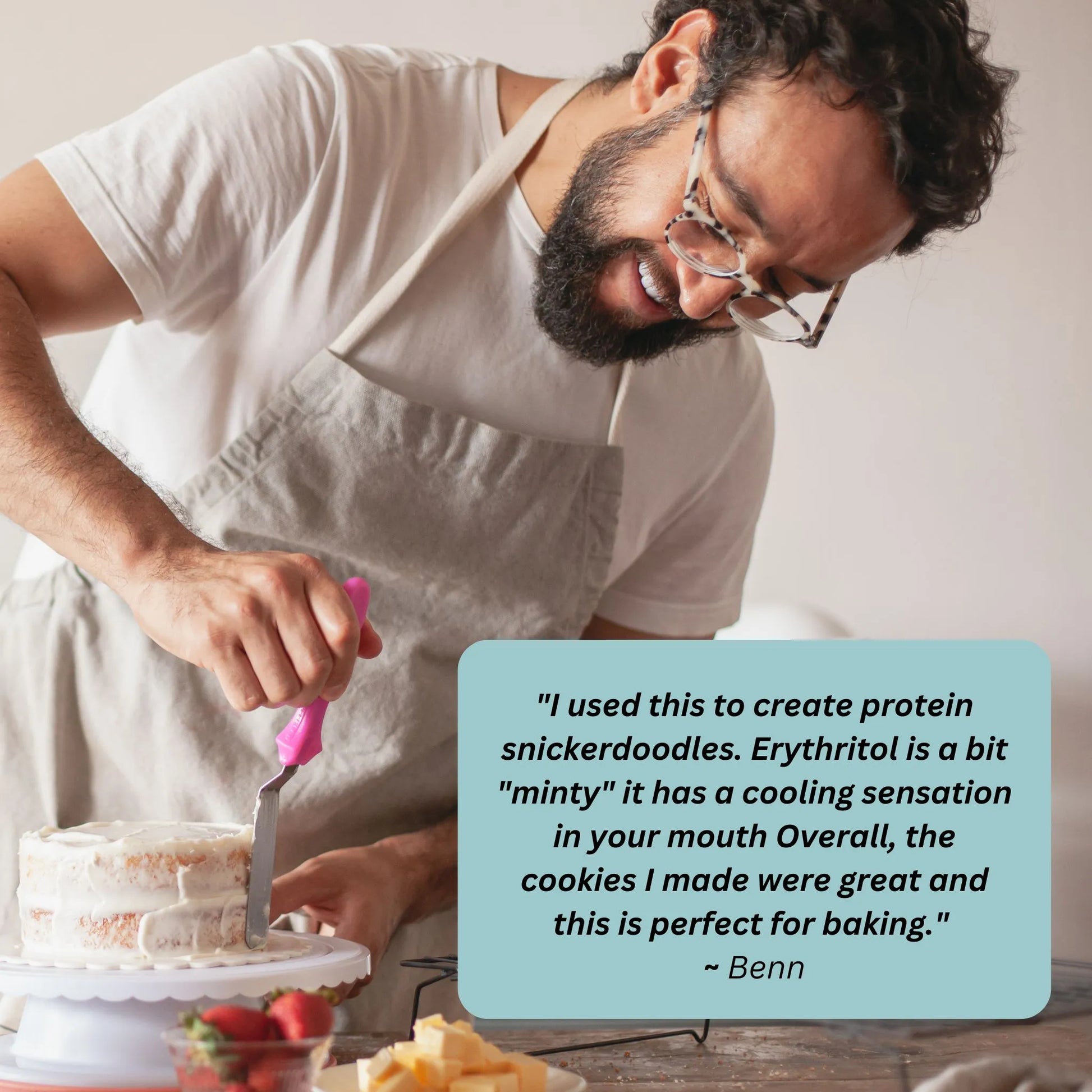 A man in glasses and an apron smiles while icing a cake. A quote about baking with erythritol is overlaid.