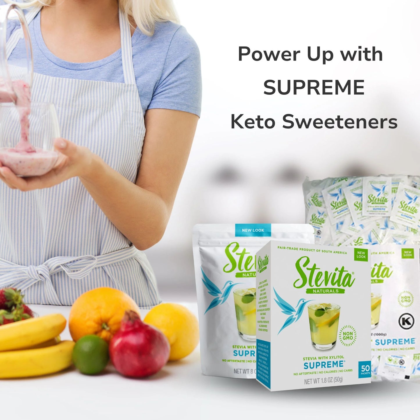 A woman in a apron pours a smoothie into a glass. Nearby are fruits and Stevita Naturals keto sweeteners with the text "Power Up with SUPREME Keto Sweeteners."