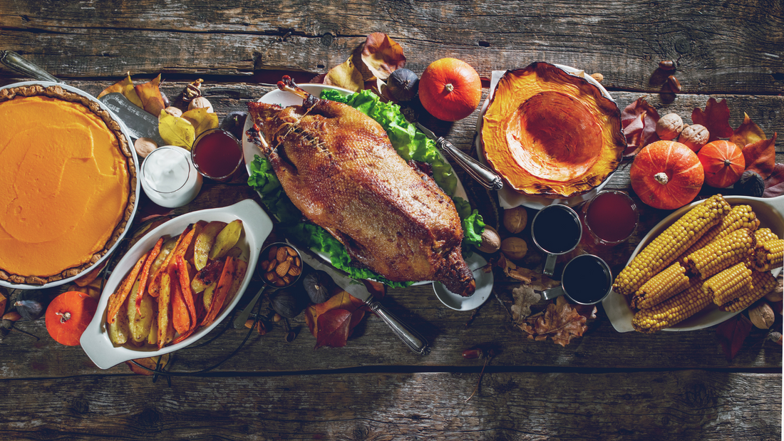 Low-sugar Thanksgiving meal featuring healthy dishes like roasted turkey, sweet potato mash, and stevia-sweetened pumpkin pie.