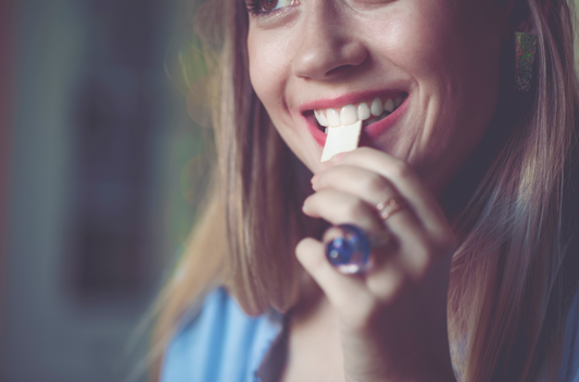 woman chewing sugar free gum